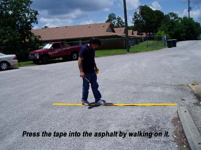 striping asphalt parking lots with pavement tape
